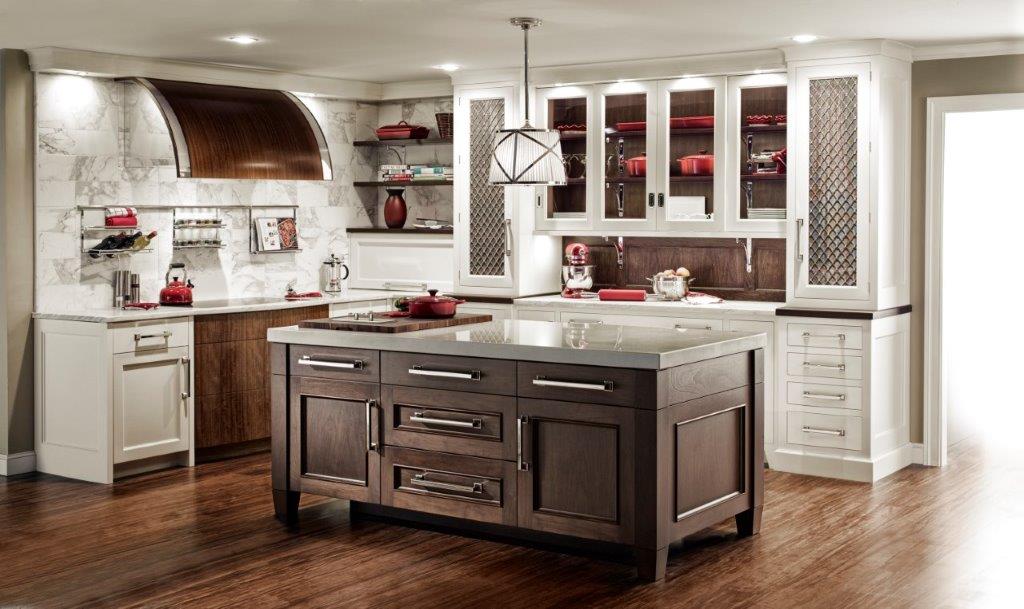 Remodeled kitchen with walnut island, white glass-front cabinetry, and marble backsplash