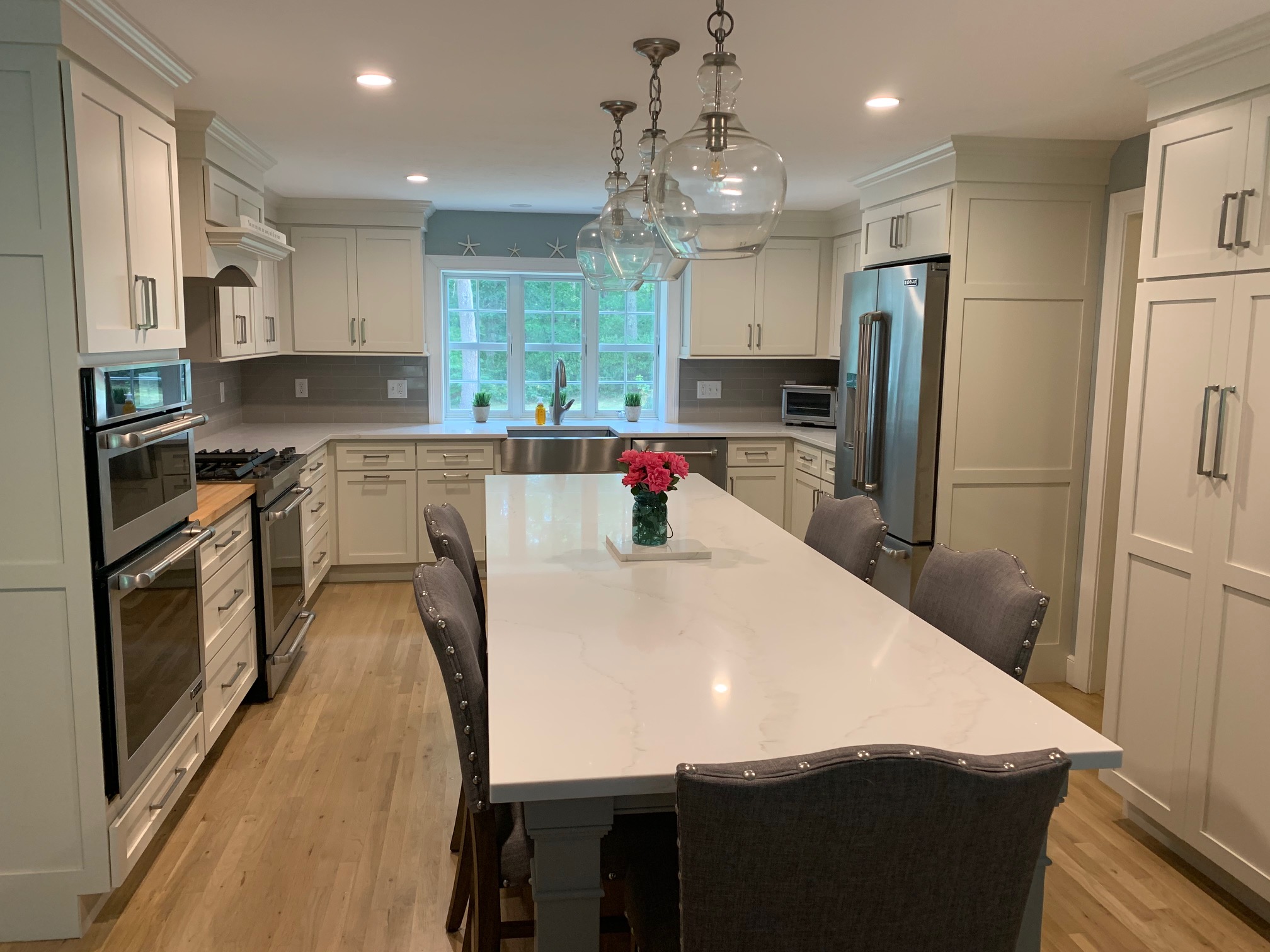 Remodeled kitchen with new cabinetry and countertops